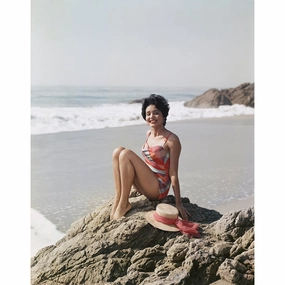 "Young Woman Sitting Beside the Sea" from Getty Imagesnordic style wall decor
