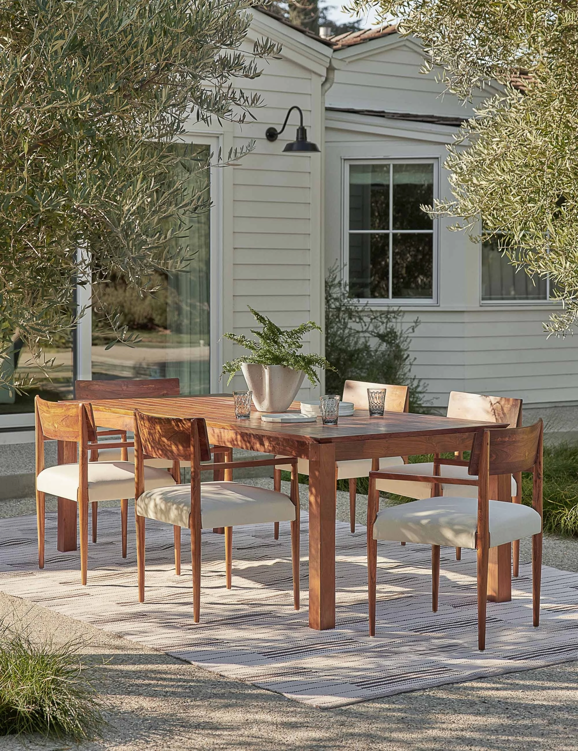 Garner Indoor / Outdoor Dining Tableoutdoor wrought iron plant stand